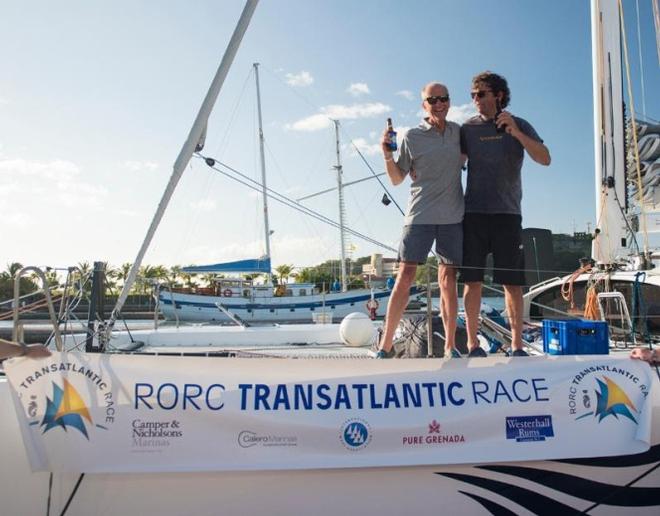 Gerald Bibot and Michel Kleinjans celebrate dockside at Camper and Nicholsons Port Louis Marina - 2015 RORC Transatlantic Race © Orlando Romain / RORC